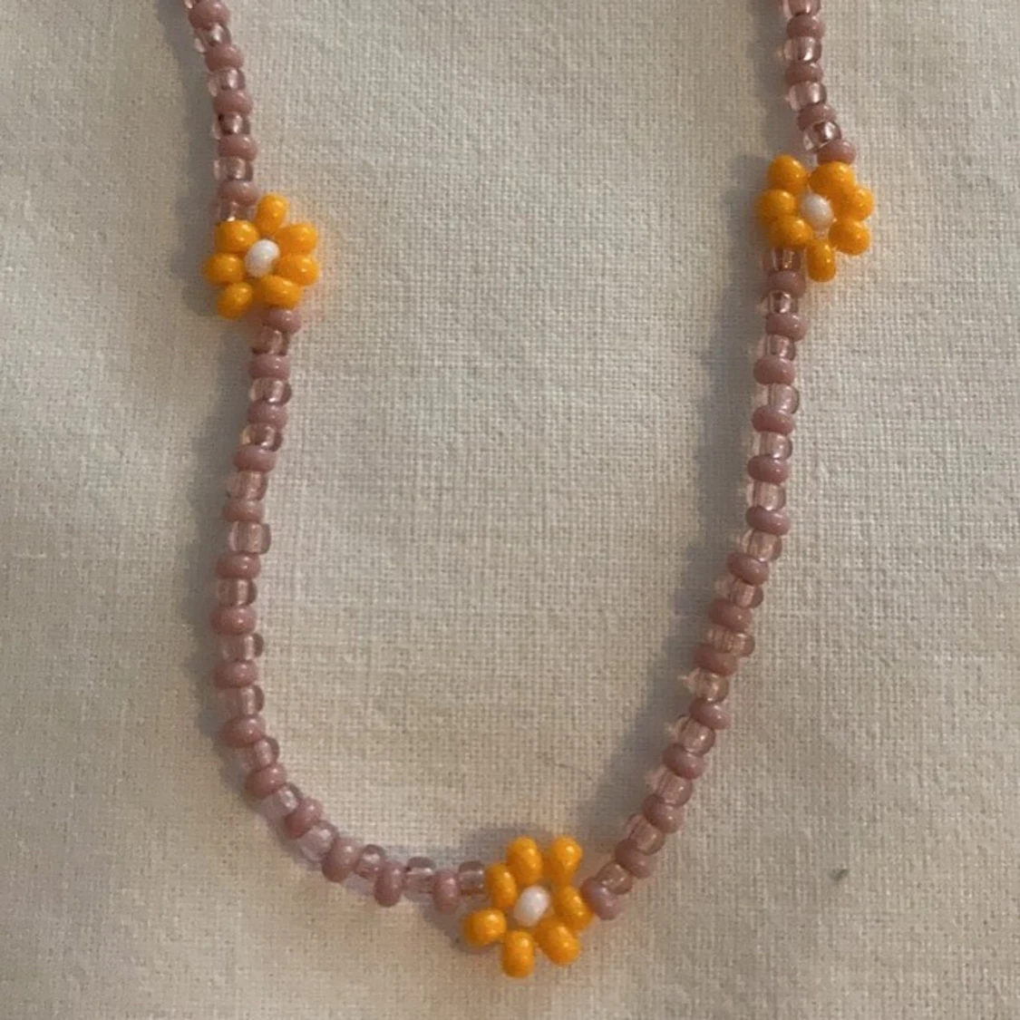 Halsband blommor - 90