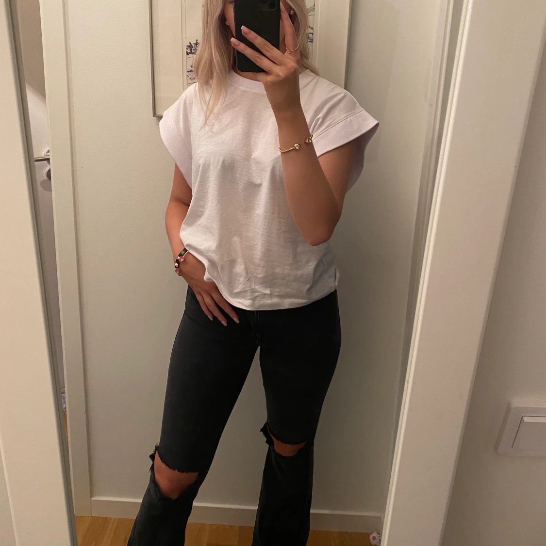 Bootcutjeans med hål  - 91