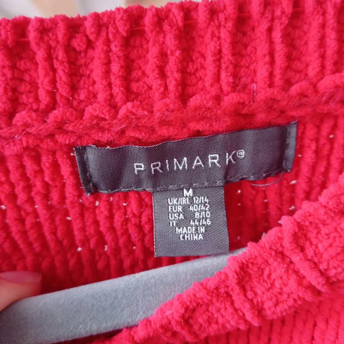 Röd stickad tröja från Primark storlek M - 90