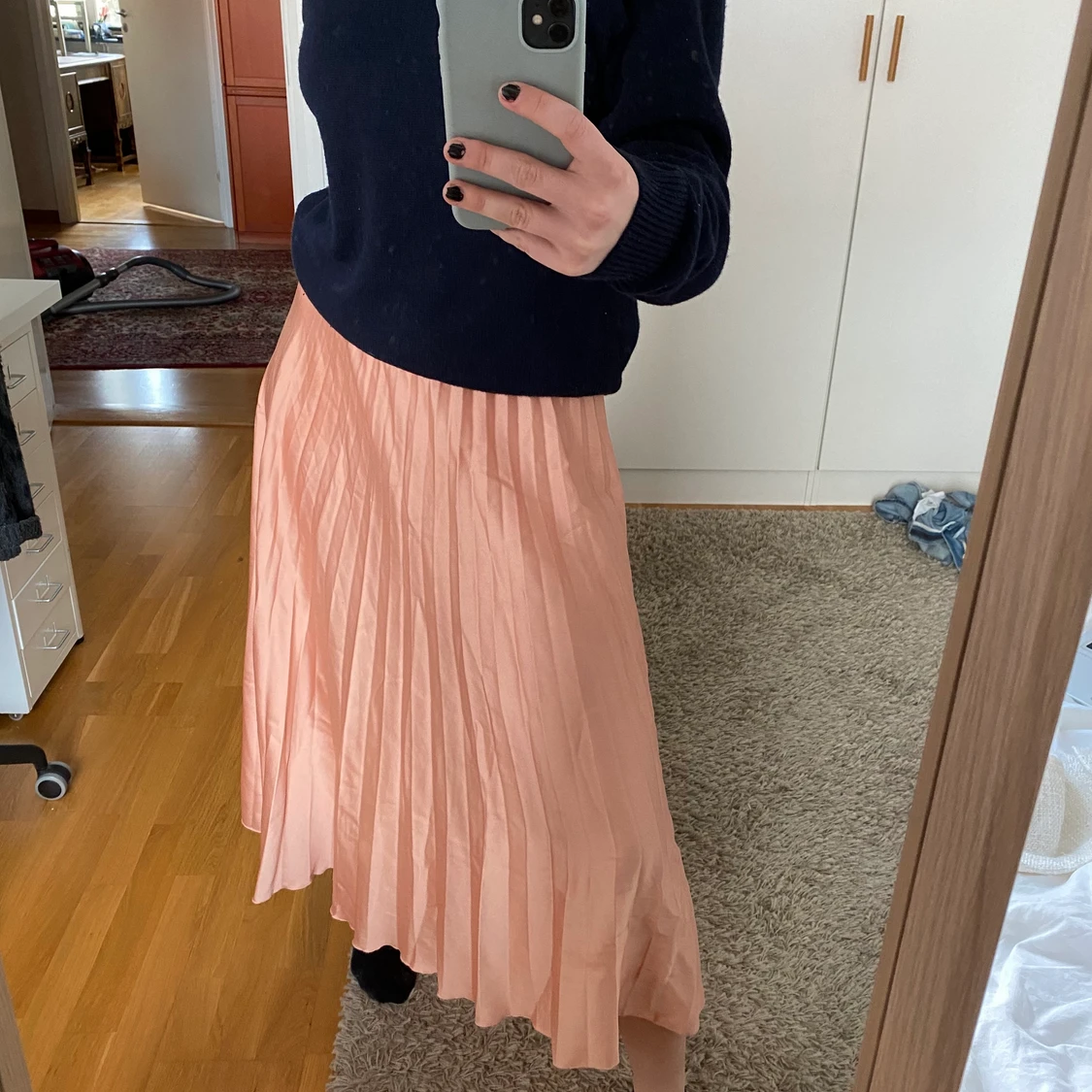 Plisserad rosa långkjol