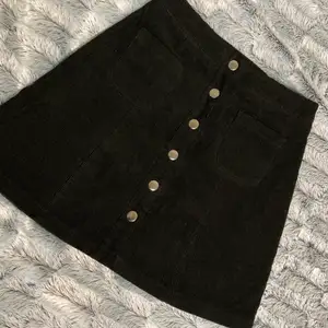 Short black skirt. Type of material shown in second picture. Worn once. Made in Romania 