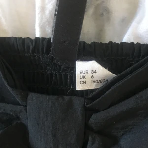 Magtröja strlk XS - Den är helt oanvänd, tvättad en gång svart och lite kort.