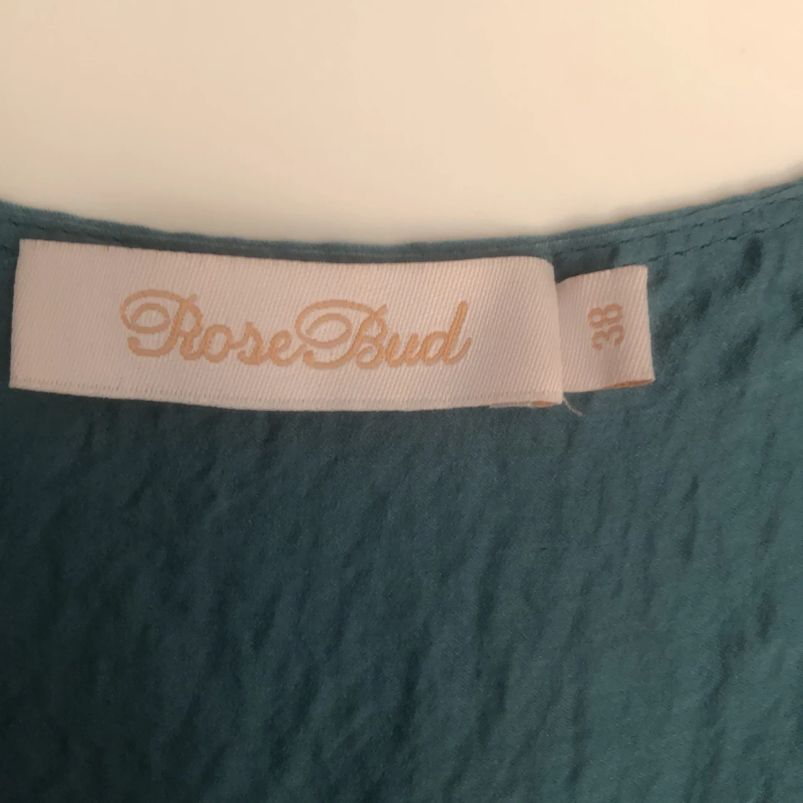 Turkos långärmad blus i silkesmaterial slt 38 - 90