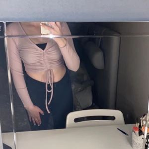 Pastell lila topp - Pastell lila topp i storlek XS, sitter rätt så tight 