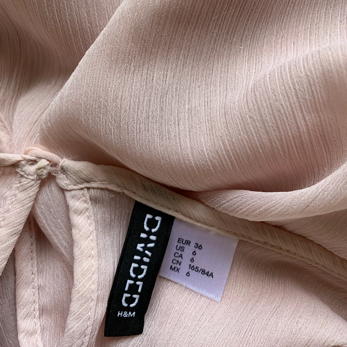 Rosa blus med volanger - 91