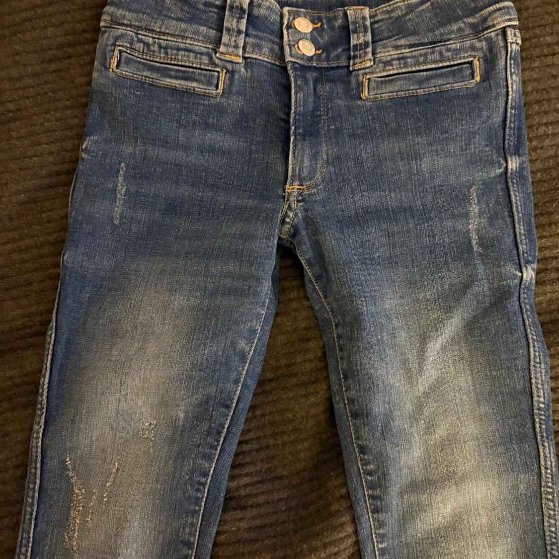 Blå low waist bootcut jeans med dubbla knappar - 1