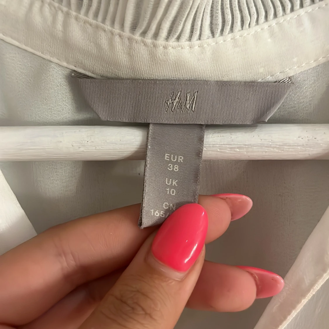 Vit ärmlös blus från H&M - 1