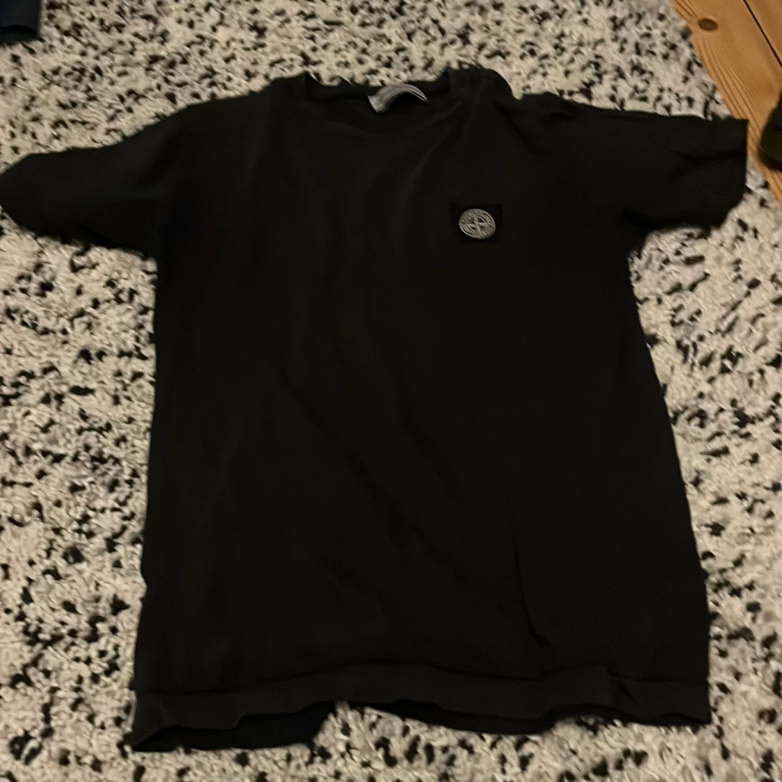 Svart t-shirt från Stone Island Junior
