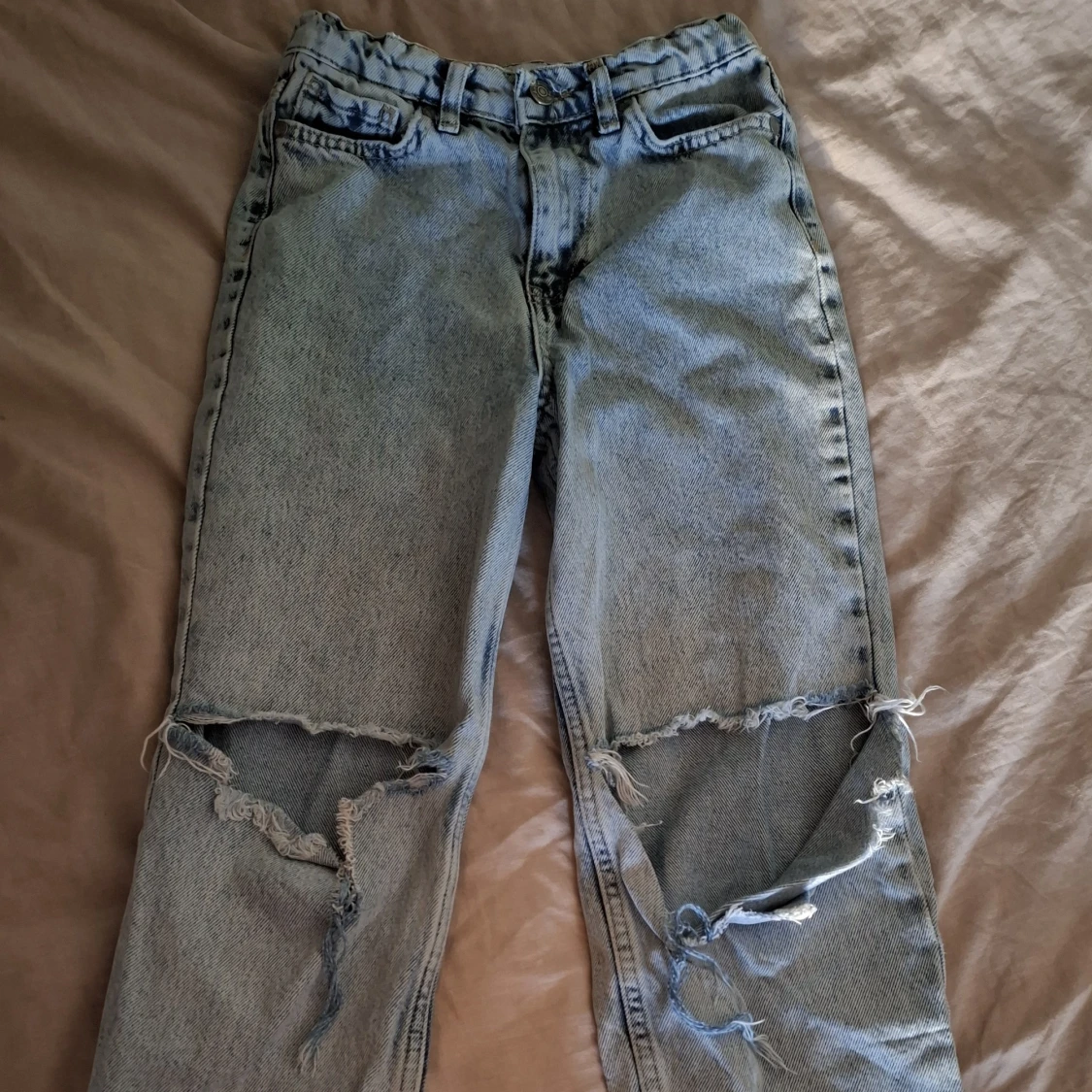 Ljusblå ripped jeans Denim Day 140