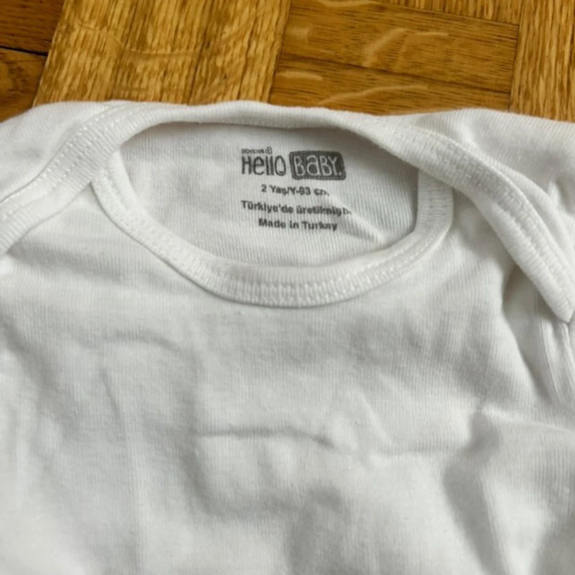Vit långärmad body från Hello Baby - 1