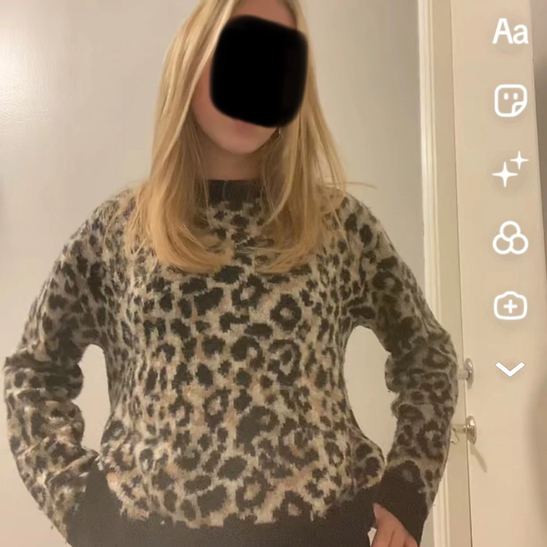 Leopardmönstrad stickad tröja