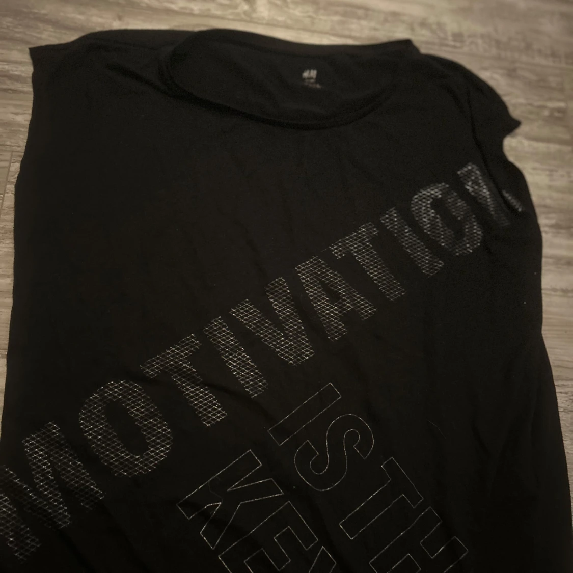 Svart sportig t-shirt från H&M