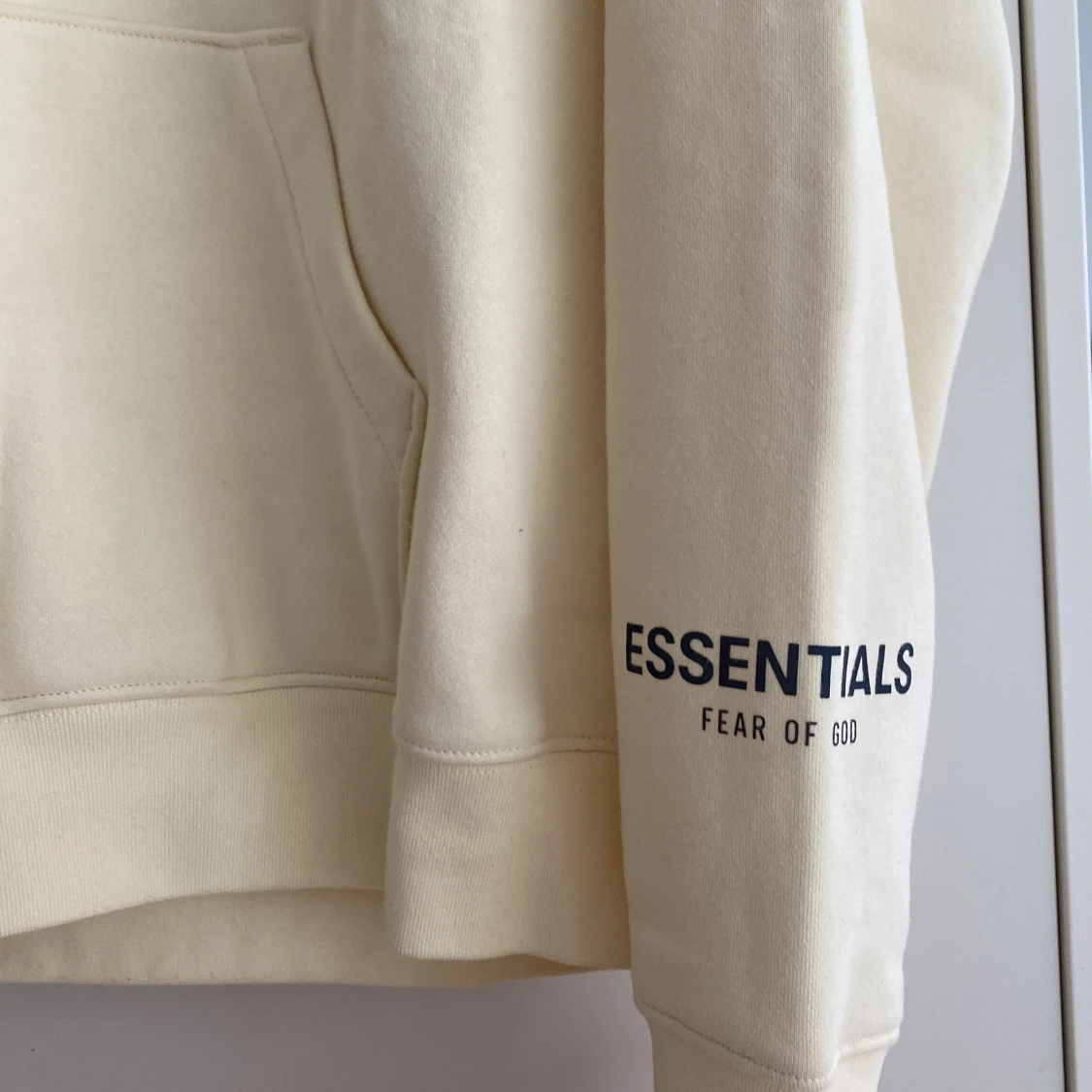 Essentials hoodie i beige från Fear of God - 1