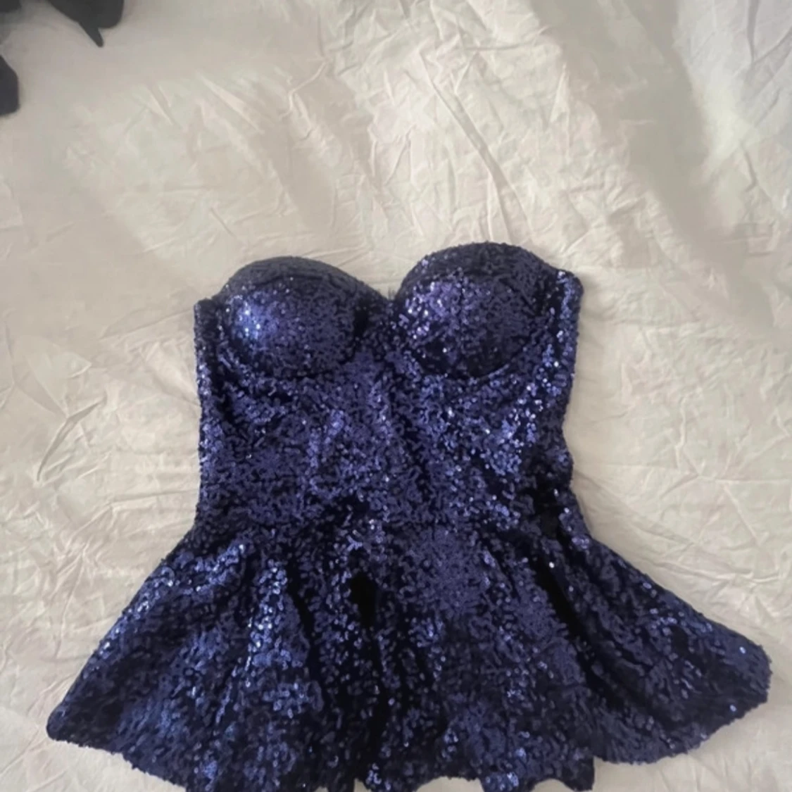 Mörkblå paljettopp