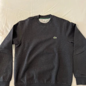 Lacoste tröja  - I perfekt skick.