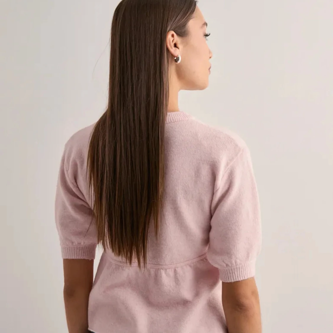 Ljusrosa stickad topp med puffärm - 1