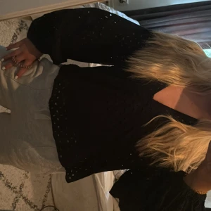 Svart blus  - Svart blus ifårn Stockholm LM