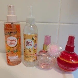 Body mist set - Set med 4 st body mists. La rive-Happy vibes 200 ml (se mängd kvar), Pop & Candy - Tutti Frutt 150 ml endast testad, H&M- Cherry Body mist 100 ml endast testad och H&M- Chupa Chyps 100 ml endast testad. 60 kr för alla 4. 