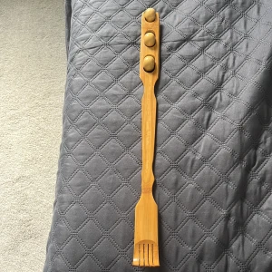 Ryggkliare - Ryggklirare, helt ny, mycket bra, trä.