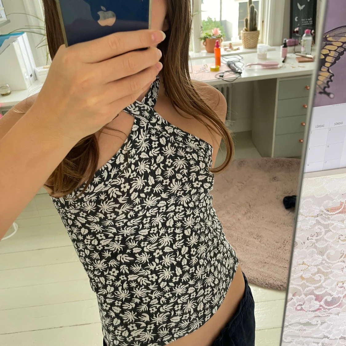 Svart omlott linnetopp