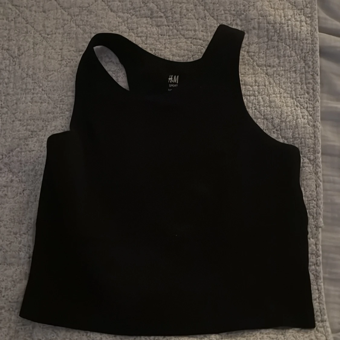 Svart linnetopp från H&M Sport