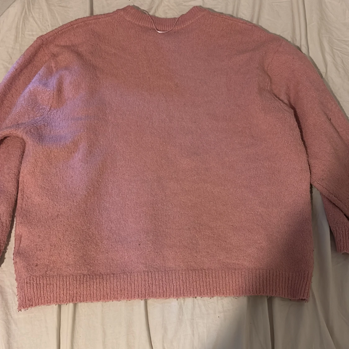 Rosa stickad tröja med rund hals - 1