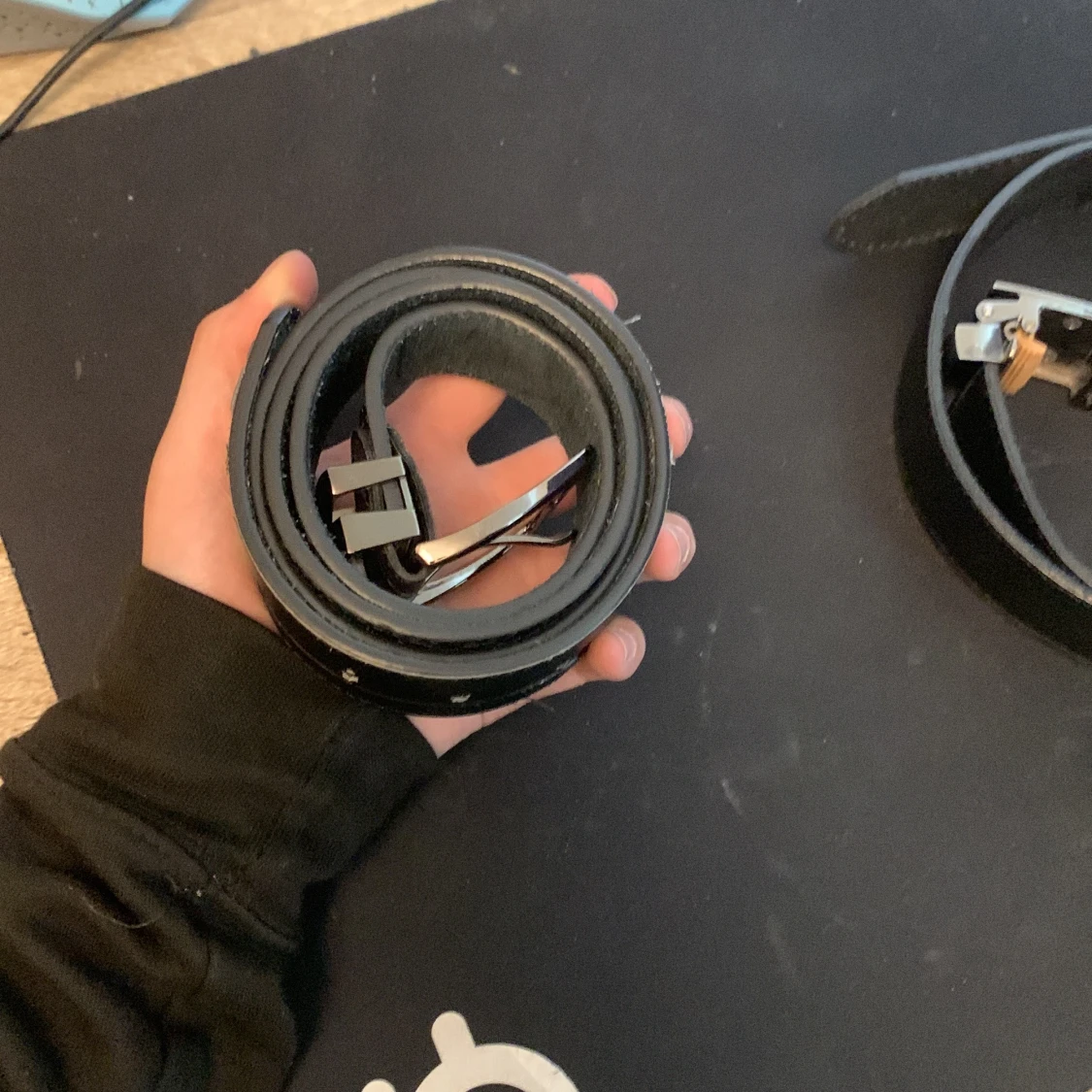 Svart bälte från Levi's 501 med silverfärgat spänne