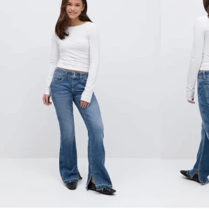 Lågmidjade jeans  - Fina jeans med slits modell tall