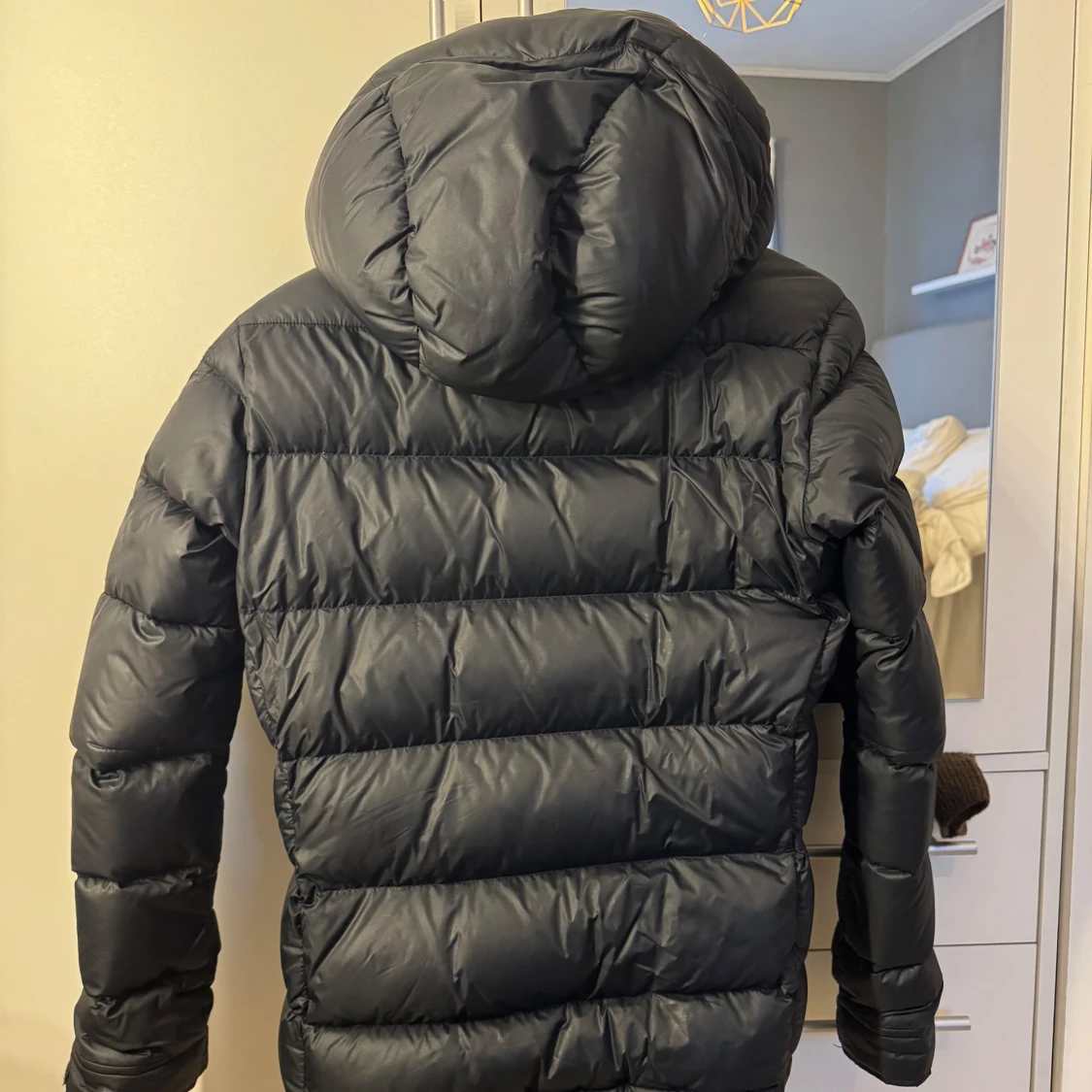 Svart dunjacka Peak Performance - 1