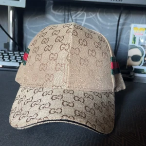 Guccl keps - Säljer oanvänd keps helt ny