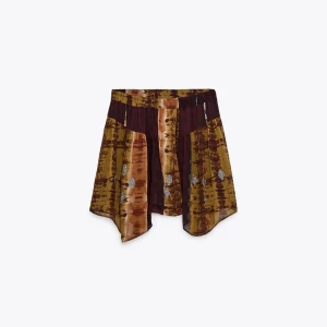 Mönstrad kjol i bruna toner - Unik kjol Med fina mönster från Zara! Aldrig använd. Köp nu för 299kr