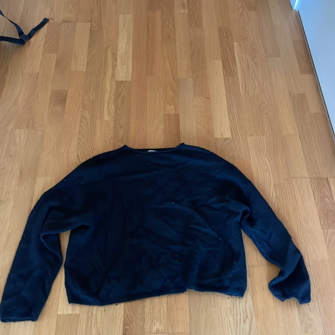 Svart stickad tröja