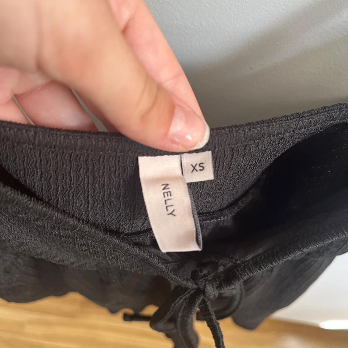 Svart linnetopp från Nelly XS - 1