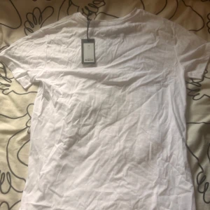 Vit basic t-shirt  - Helt oanvänd i XS