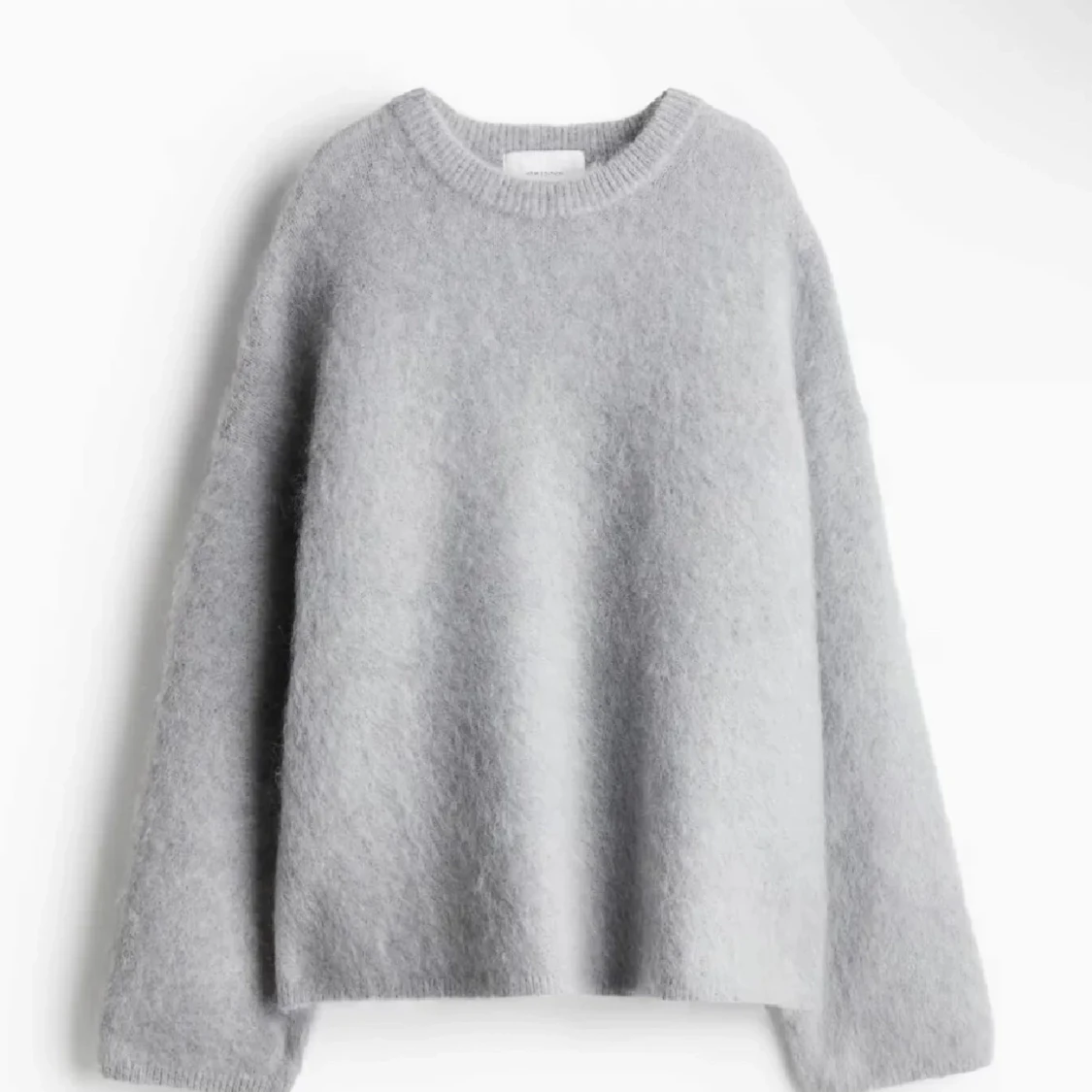 Ljusgrå stickad tröja från H&M