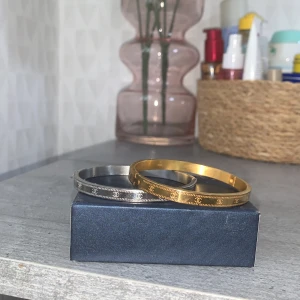 Guld och silver armband - Silver och guld armand,aldrig använda,fick dom i present,så vet inte om dom är äkta 