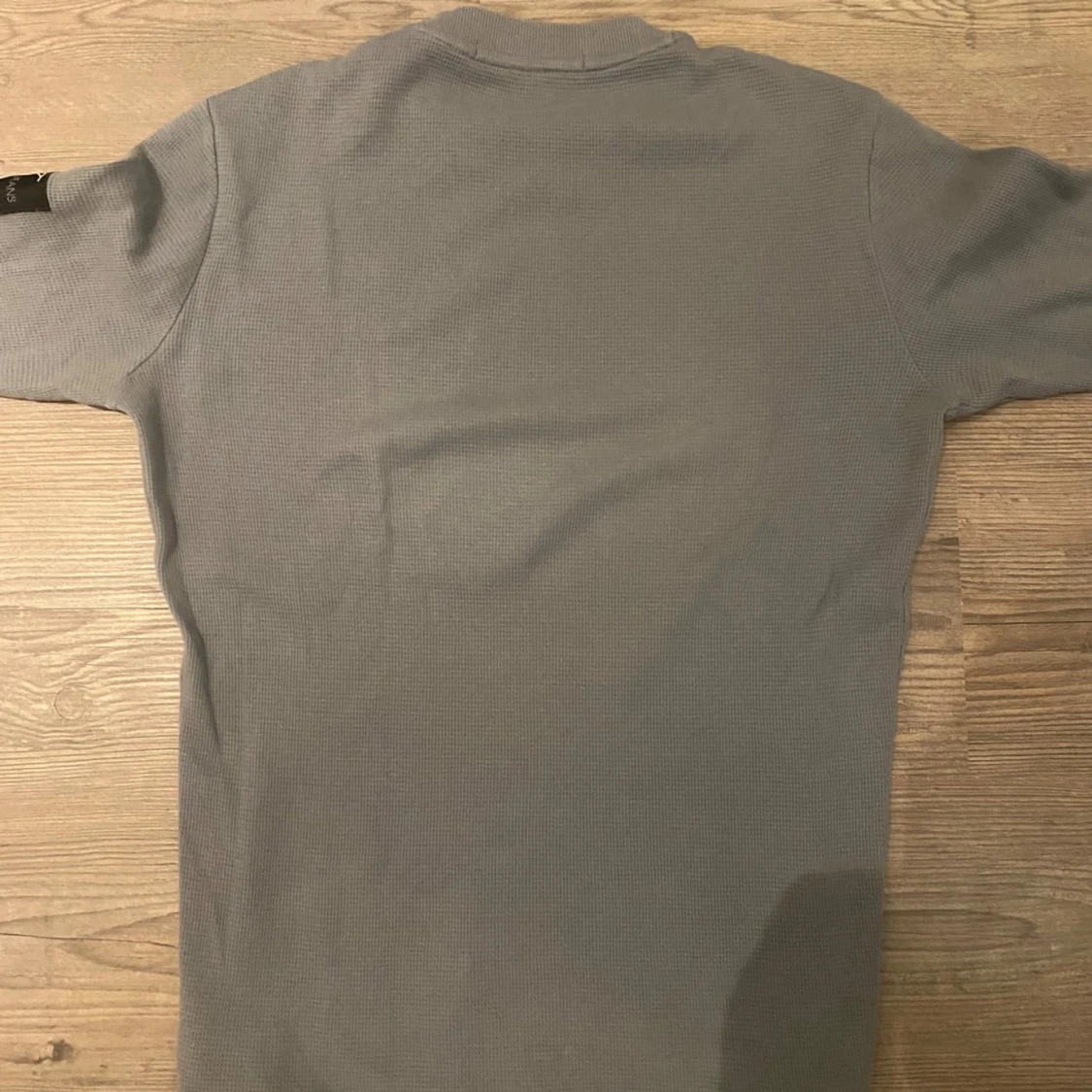 Grå långärmad tröja från Calvin Klein - 90