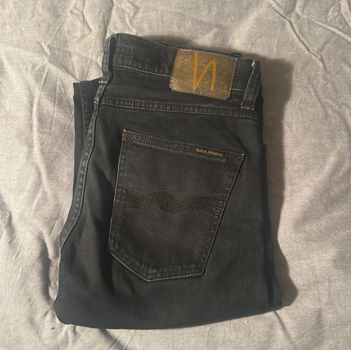 Svarta jeans från Nudie Jeans, W27 L28
