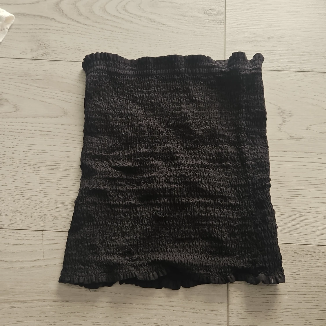 Svart smockad tubtopp från Wera