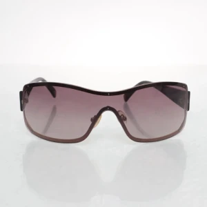 Bruna solglasögon från Victoria's Secret - Snygga solglasögon från Victoria's Secret med stora, bruna bågar och tonade linser.