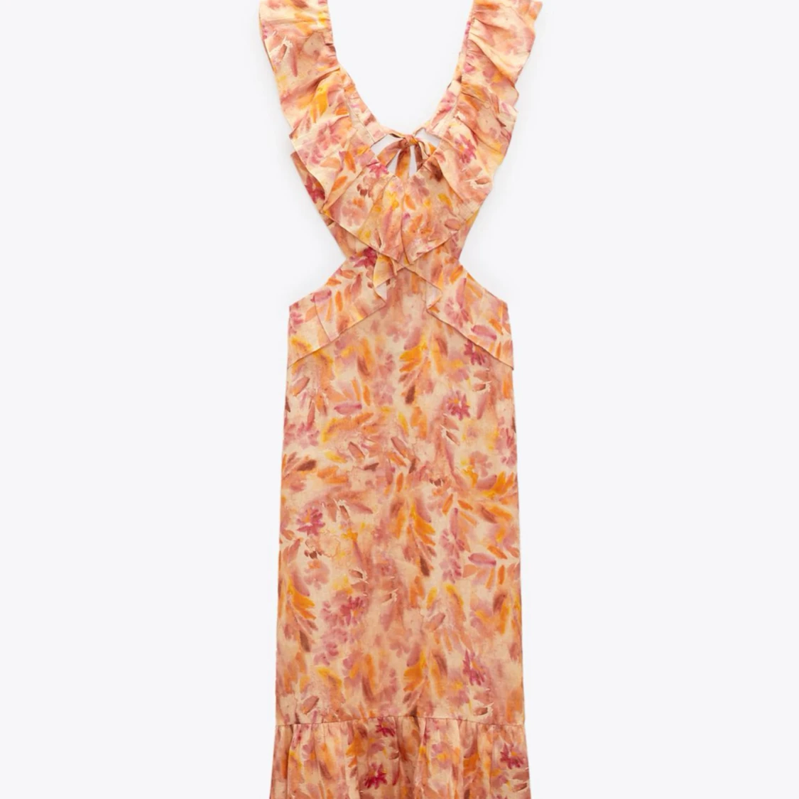 Blommig klänning med volangdetaljer