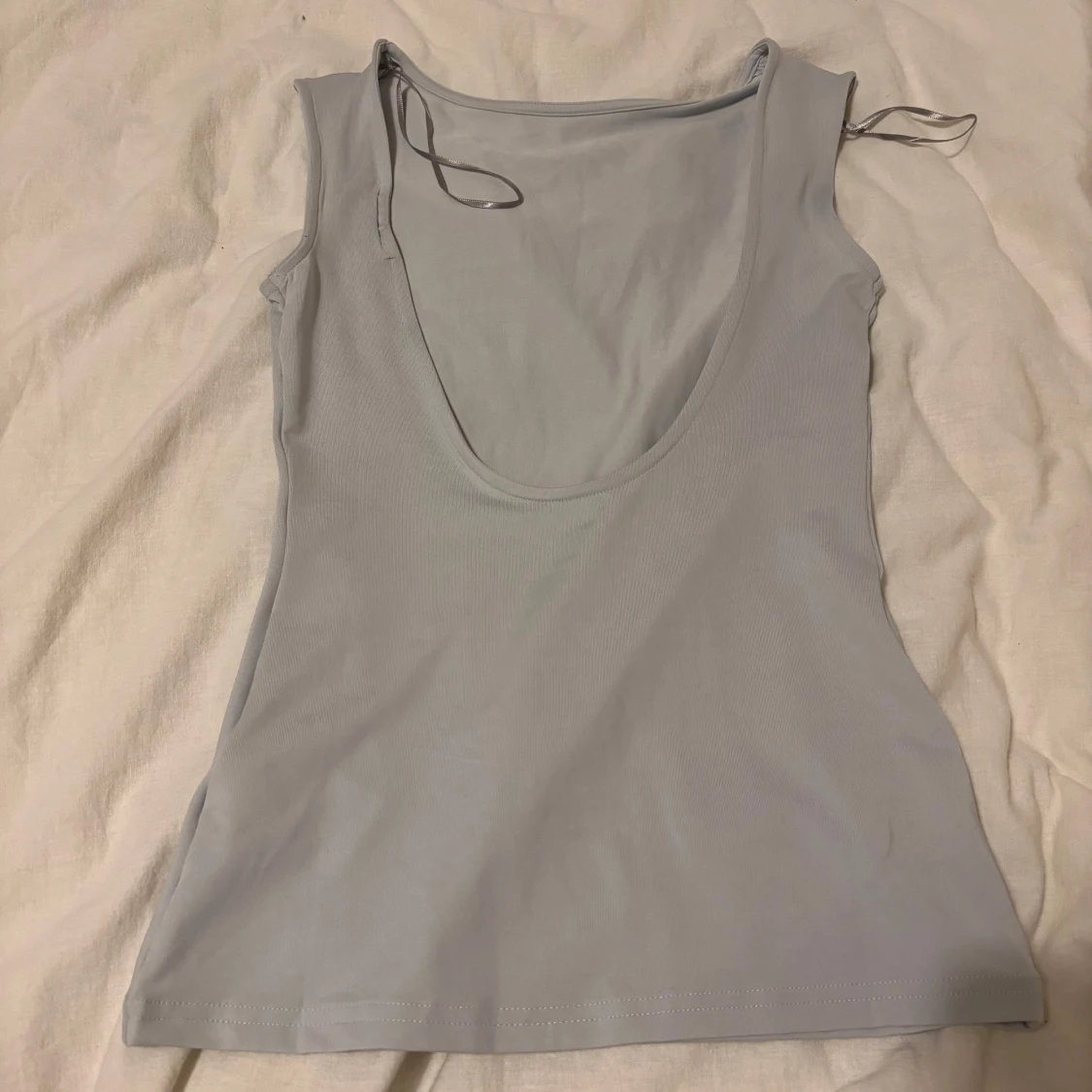 Ljusblå ärmlös linnetopp - 1