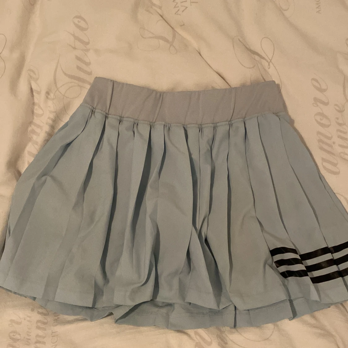 Snygg blå padel kjol