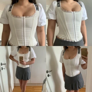 Korsett topp  - Populär I.AM.GIA korsett strl XS. Liten missfärgning i texten syns i sista bild. Köpt för ca 150$aus