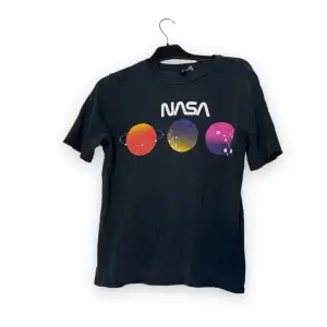 NASA tshirt som aldrig använts  Köparen står för frakten 