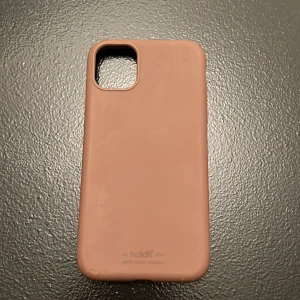 Holdit skal - Brunt Holdit skal i fin brun färg. Till iPhone 11