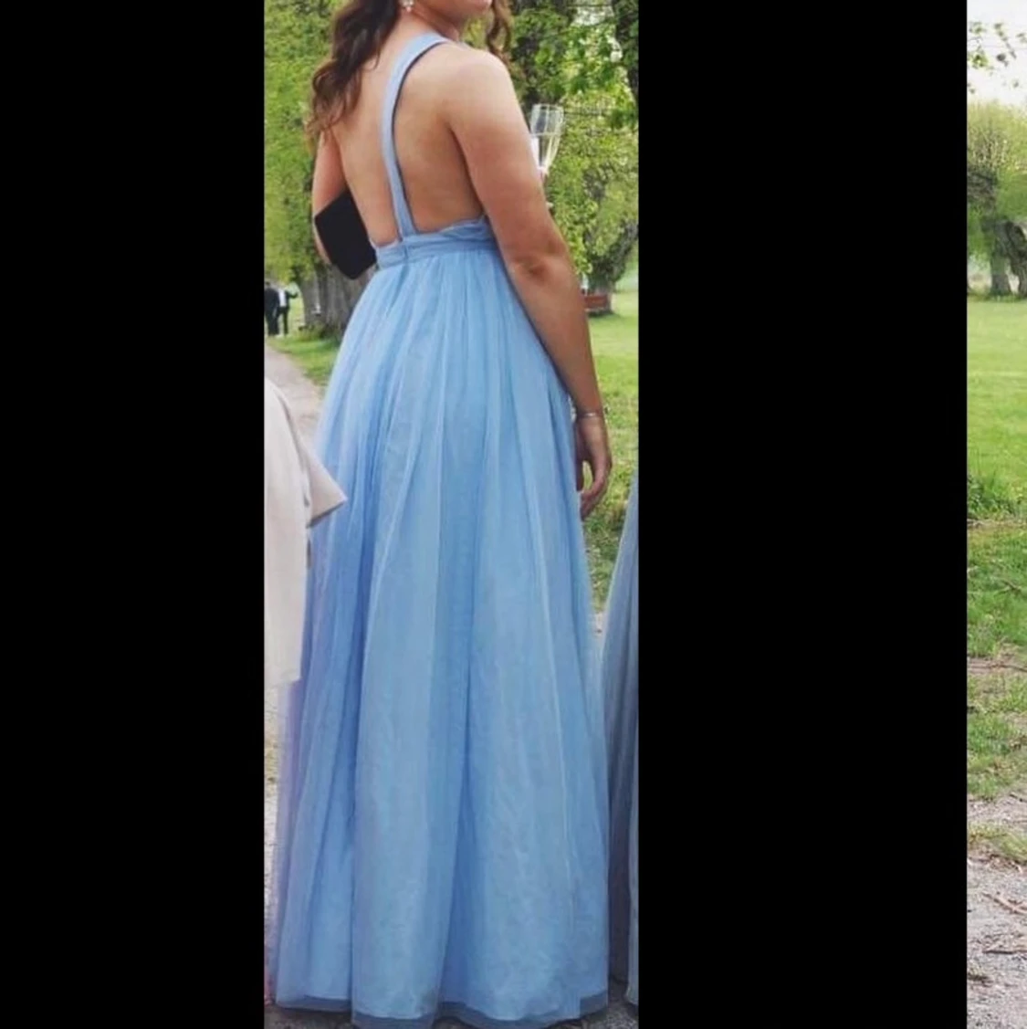 Himmelblå balklänning i tyll strl M - 91