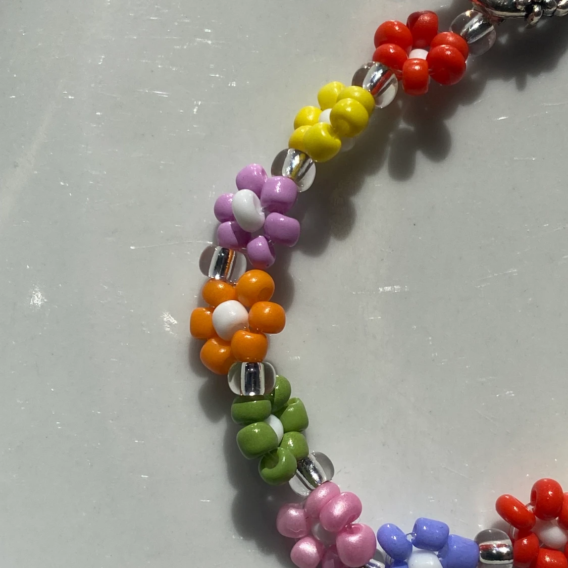 blommigt armband - 90