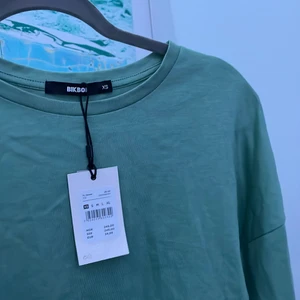 Bik bok grön öppen rygg - Likadan tröja som den beiga fast i grön öppen rygg lappen e kvar från 250 till 170