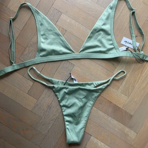 Carrie bikini - Grön bikini från Carrie. Helt oanvänd, prislapparna är kvar.